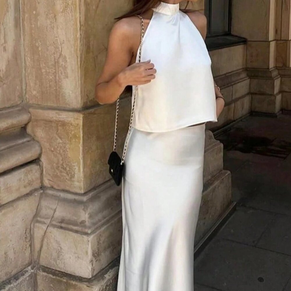 Two piece white silk tank and skirt set
